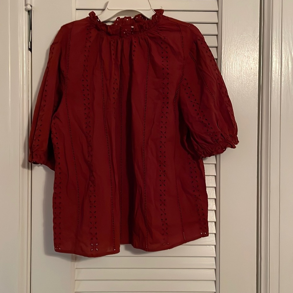 Red crew neck blouse